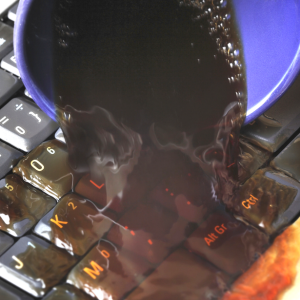You Just Spilled Water Or Coffee On Your Laptop - Here's What You Should Do