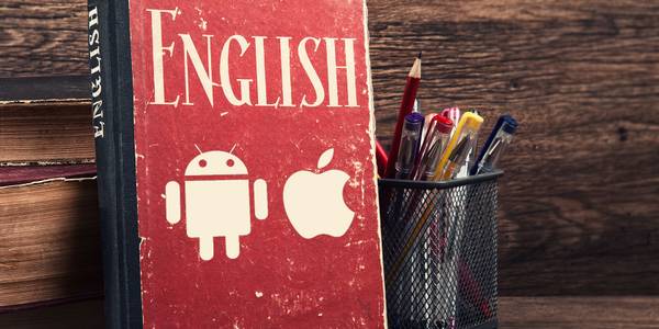 Book with English and Android/Apple logos next to pencil holder