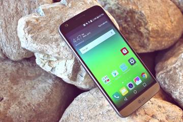 Android phone resting against rocks