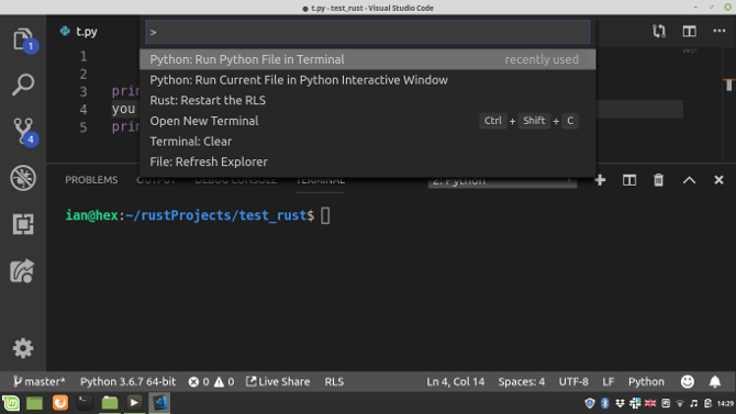 The Code-OSS command palette, running Python code in the built-in terminal
