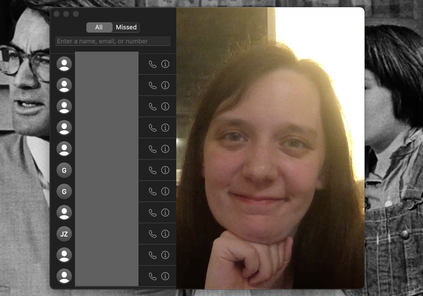 A person is visible in a FaceTime window on a MacBook Pro