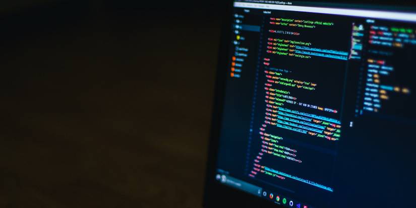 Laptop displaying atom text editor