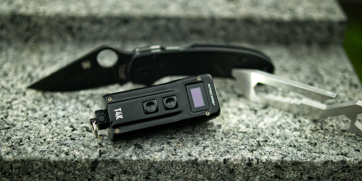 Nitecore T4k on slab with para 3 and griffin pocket tool