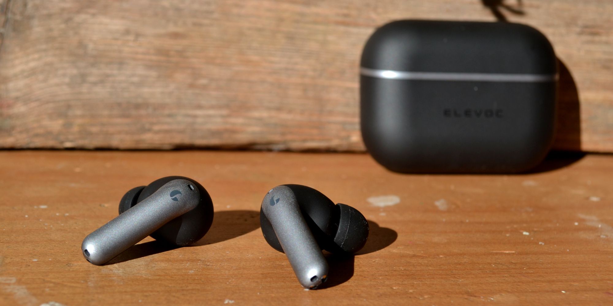 elevoc clear earbuds review earbuds case background