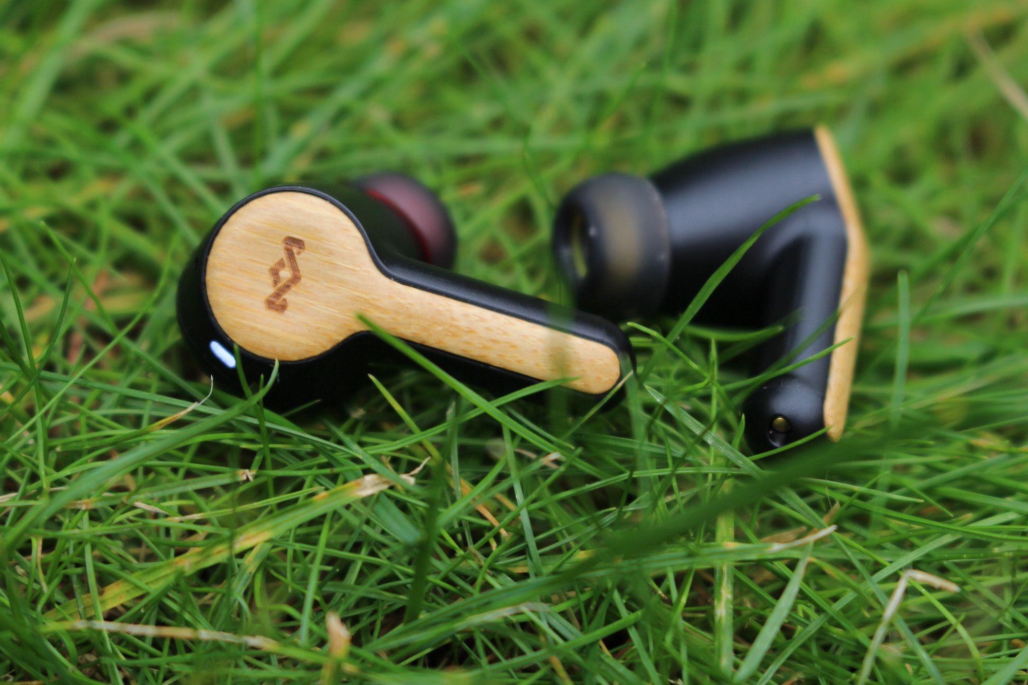 House of Marley Rebel True Wireless Earbuds on some grass