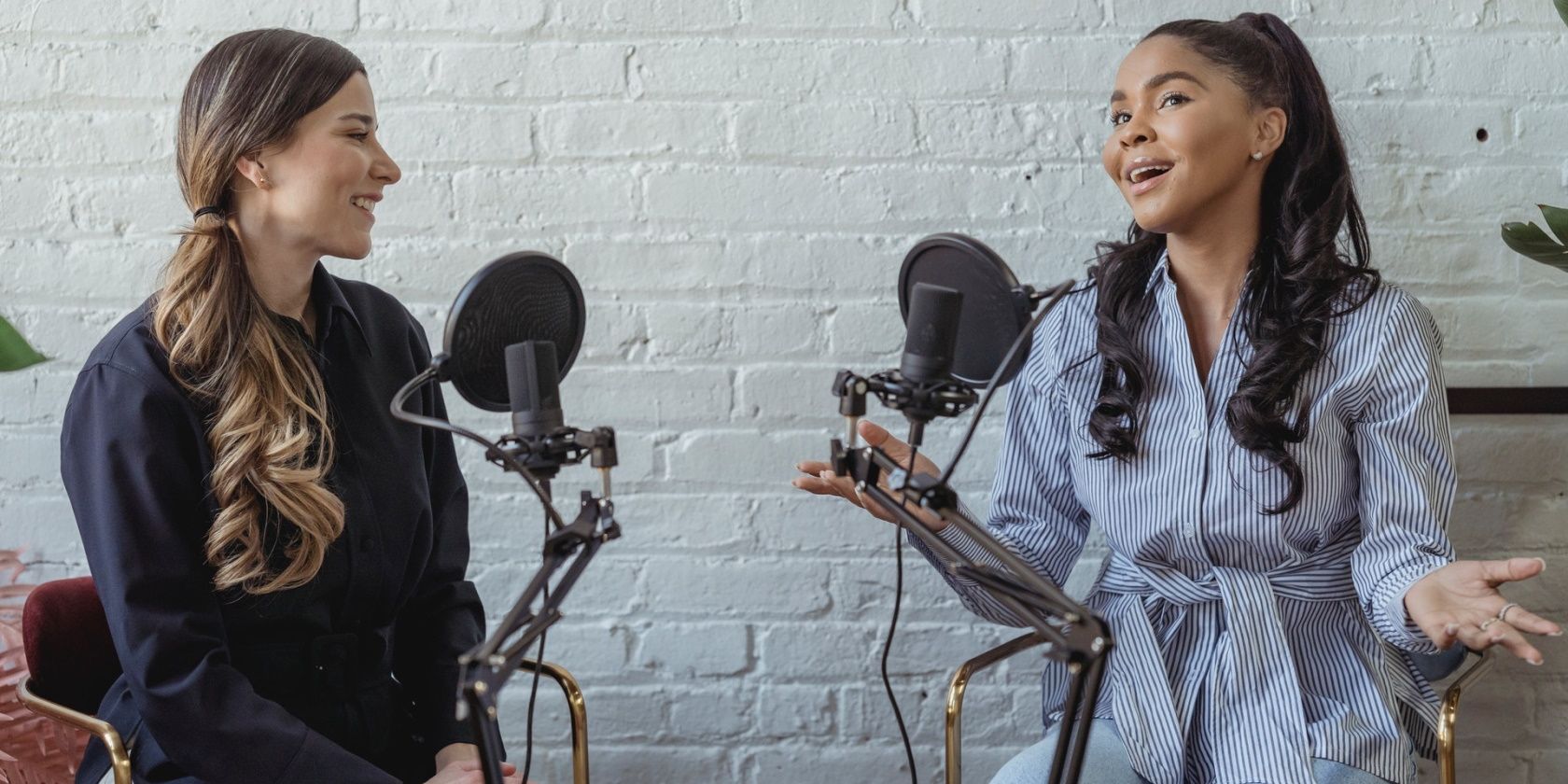 Two ladies podcasting
