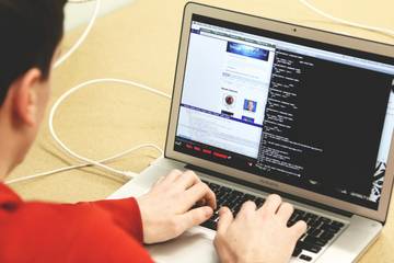 programmer writing bash scripts