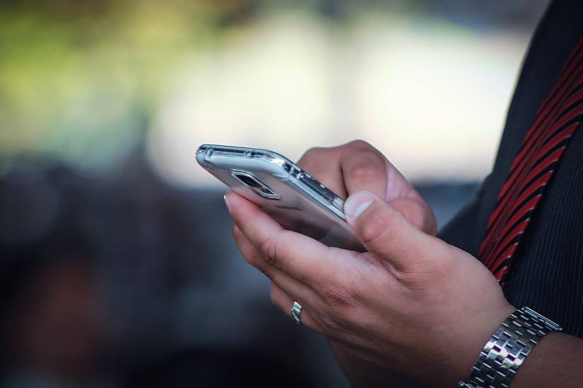 Picture of a person using their smartphone