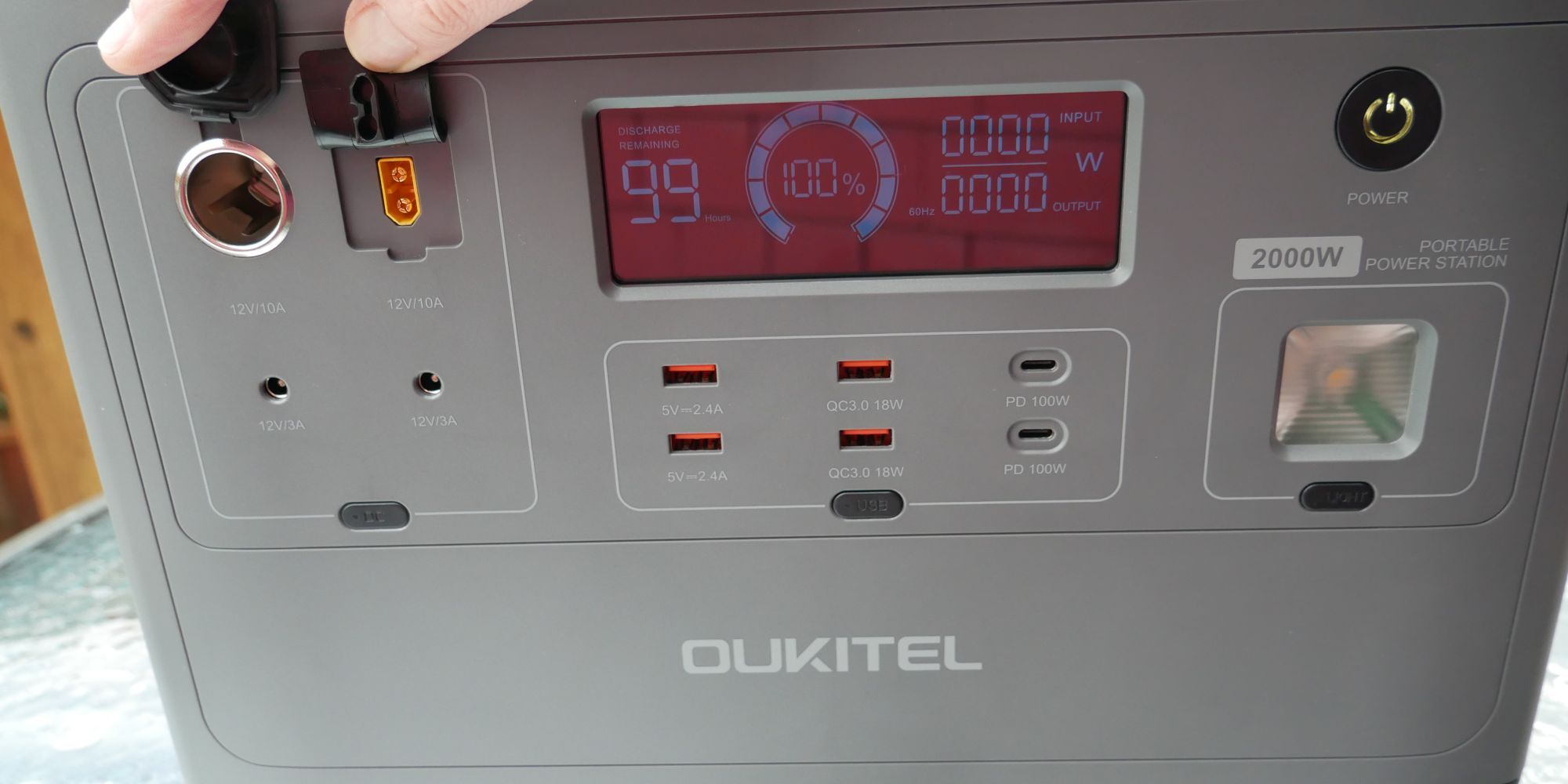 Oukitel P2001 front side with all output ports and LED display