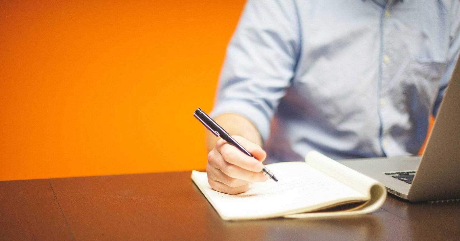  A notepad and laptop