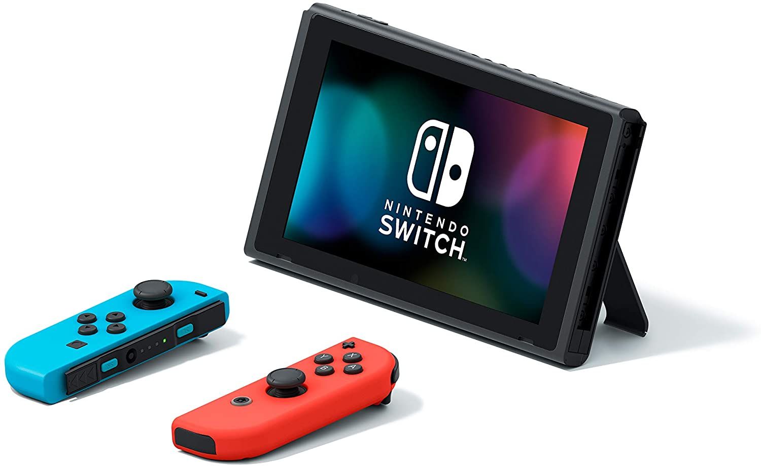 Nintendo Switch with kickstand extended, next to controllers