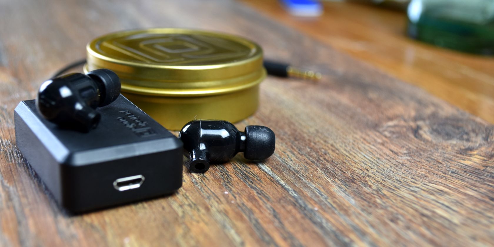 periodic audio carbon case nickel amp buds together