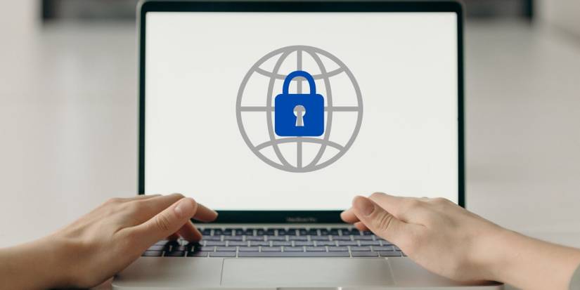 laptop with internet and lock logos on screen