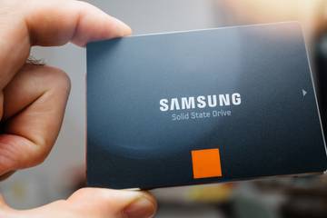 man holding samsung ssd