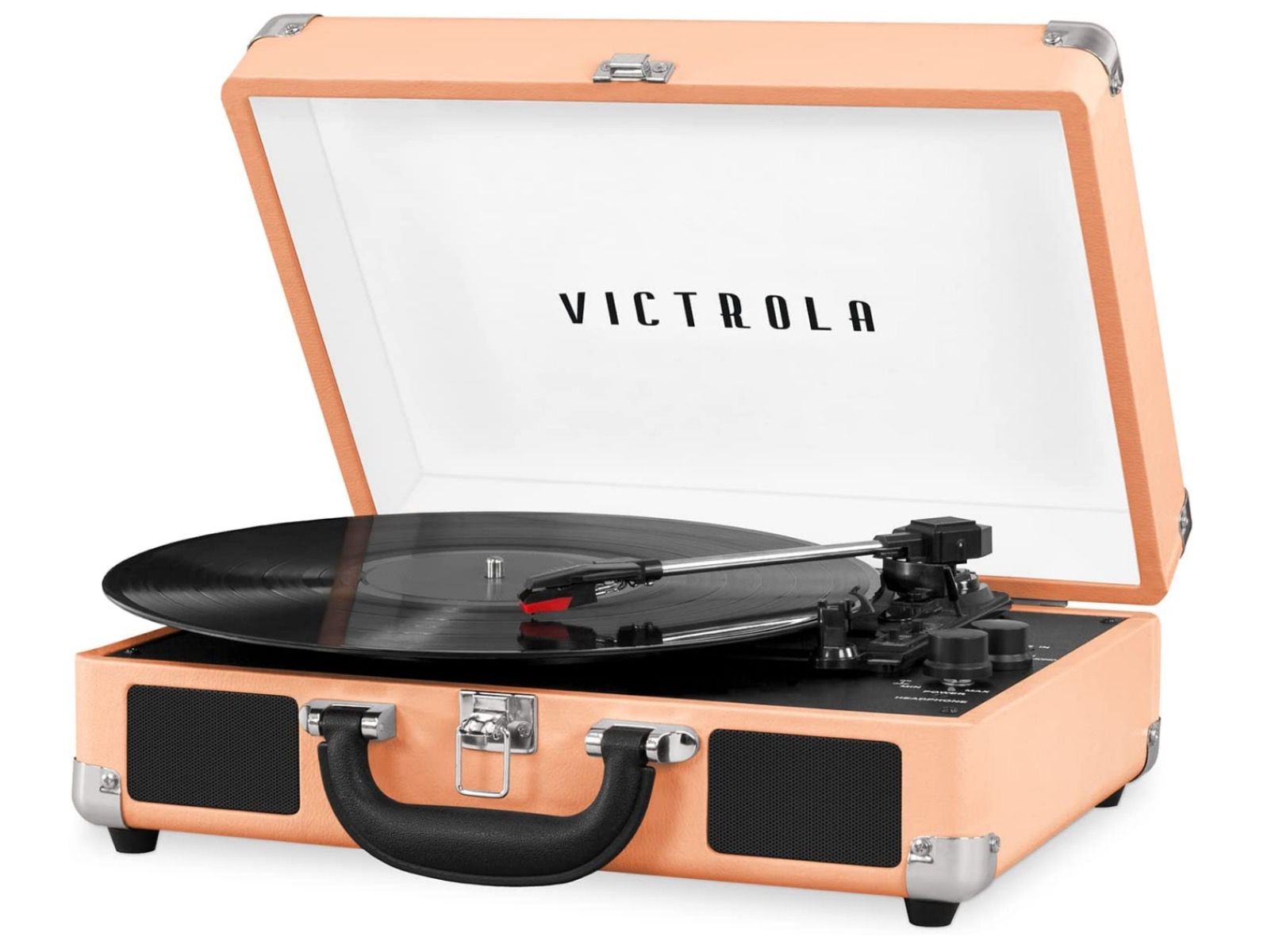 Peach colored Victrola Suitcase record player playing record