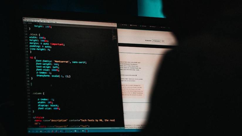 man programming a website