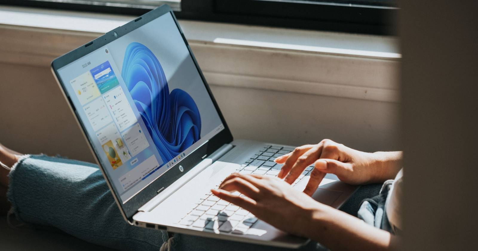 Person Working On Windows Laptop