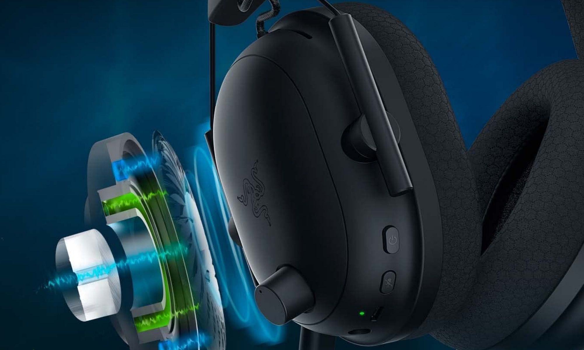 A colorful and vibrant image showing the interior design of the ear of a Razer BlackShark V2 gaming headphone set