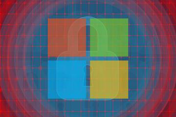 windows logo in front of lock icon on digital grid background