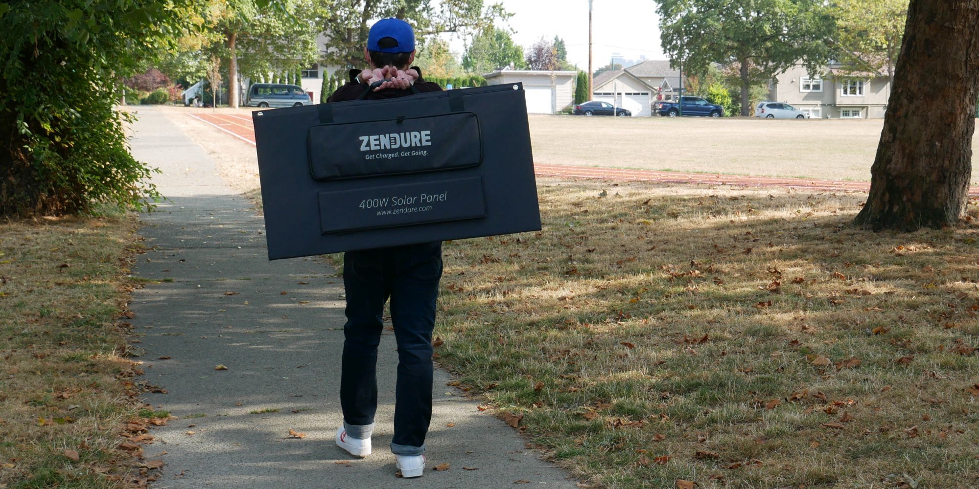 Zendure 400W Solar Panel Man Carrying Portable Solar Panel on his Back