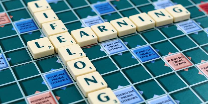 Scrabble tiles spelling Lifelong Learning on a Scrabble board