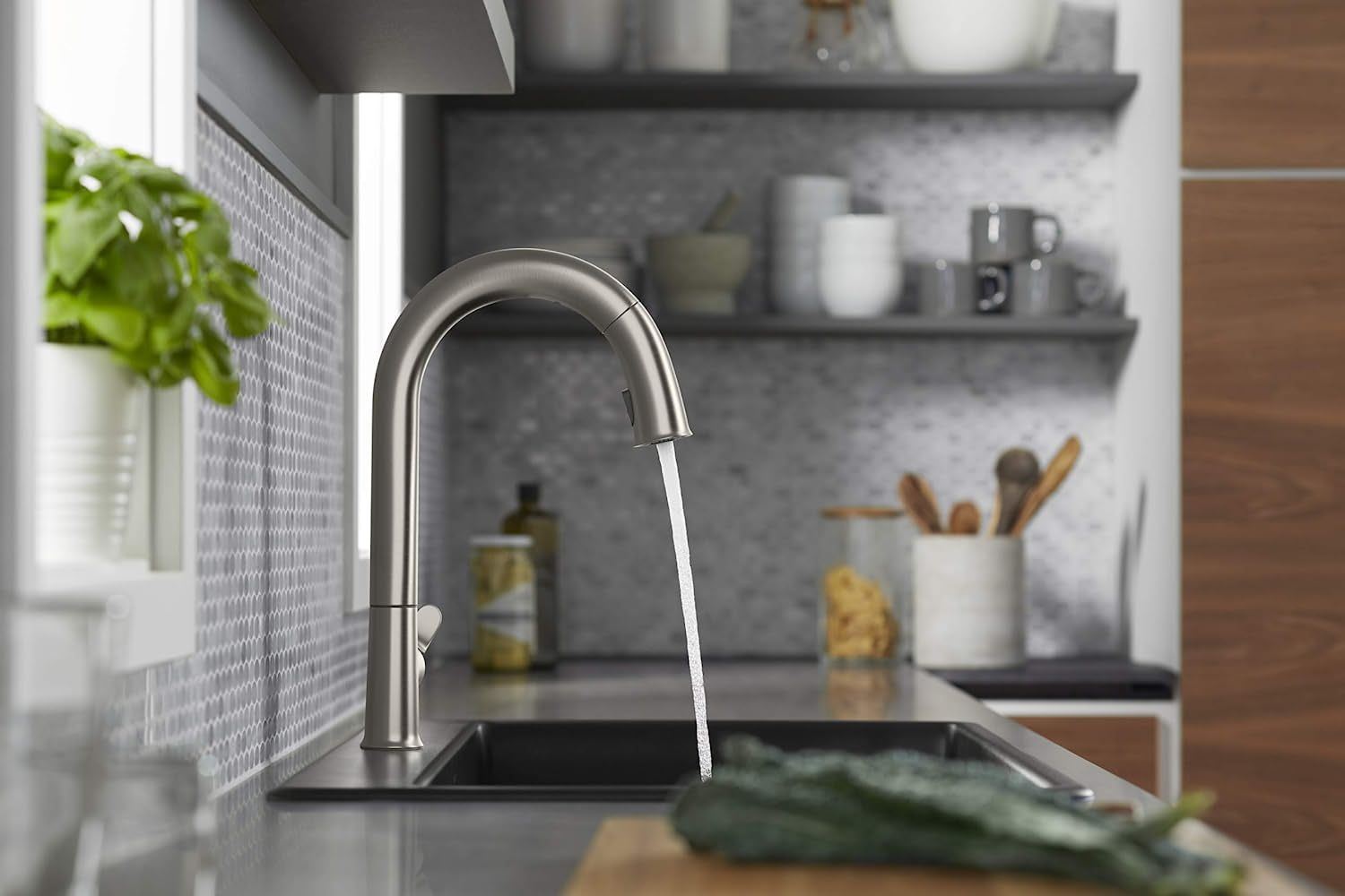 the kohler k-72218-wb-vs sensate kitchen faucet dispensing water