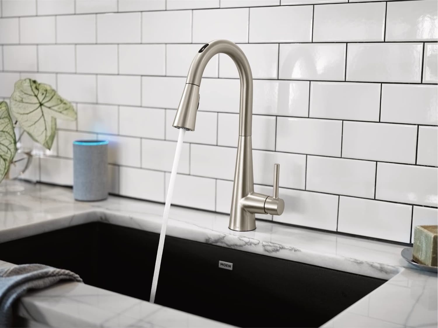 moen sleek touchless kitchen faucet dispensing water