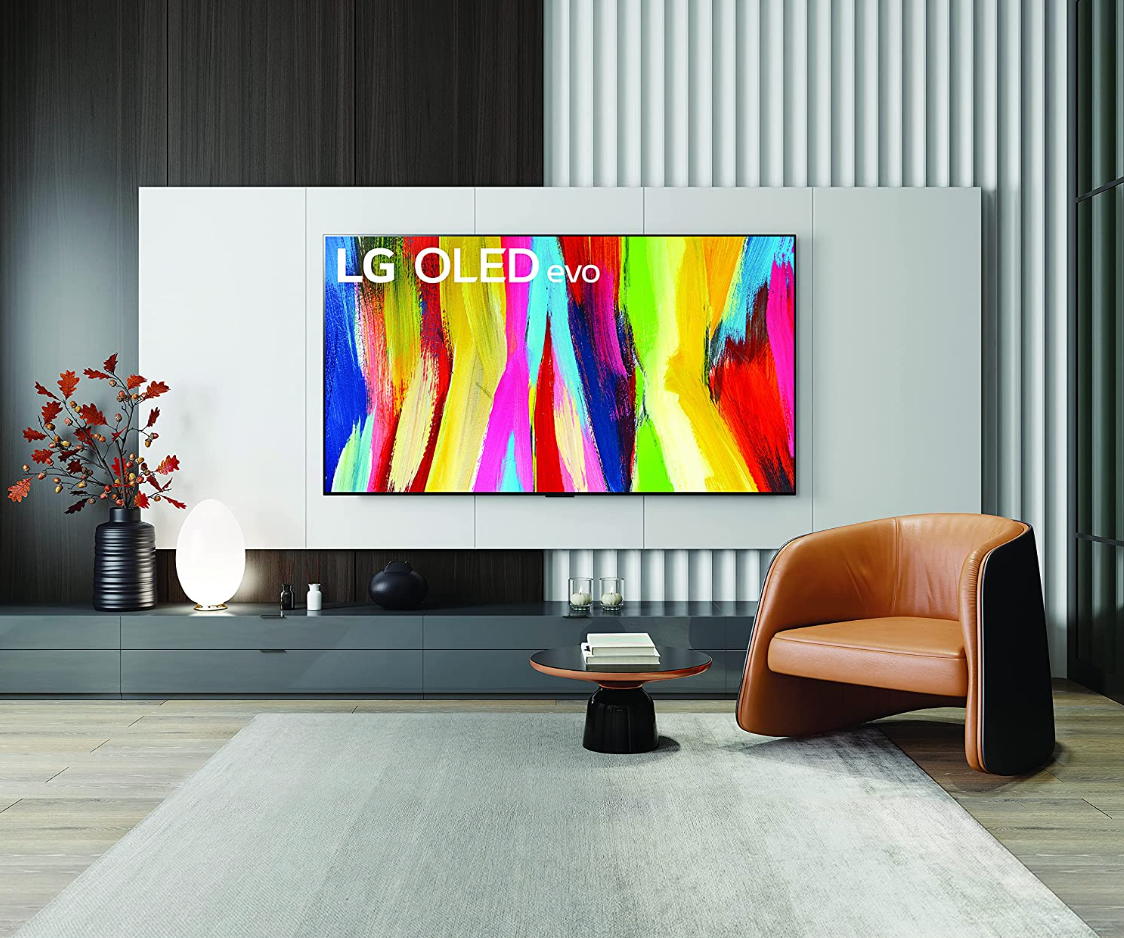 An image showing a mounted LG C2 evo OLED TV in a living room