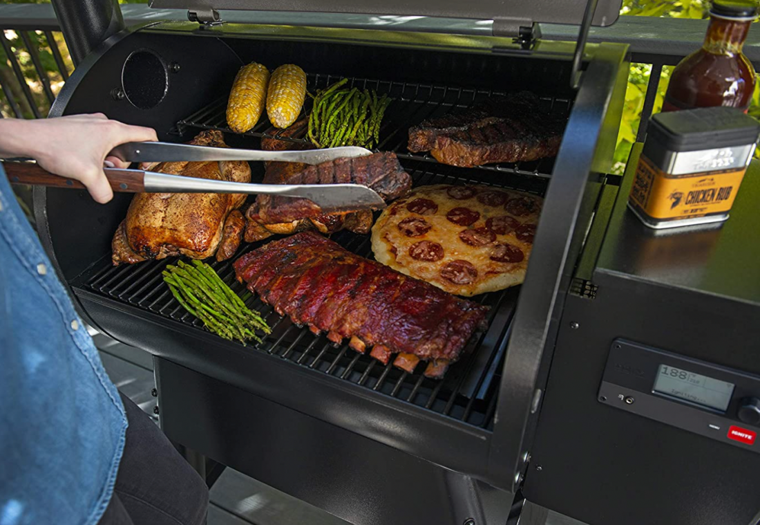 A shot of a Traeger Grills Pro Series 575 Wood Pellet Grill and Smoker showing the amount of food that can be cooked on it at the same time