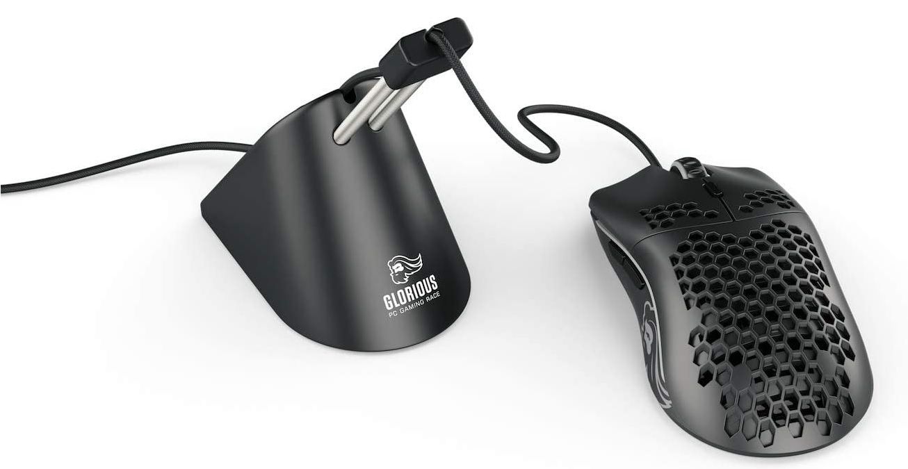 black colored glorious gaming mouse bungee alongside black computer mouse