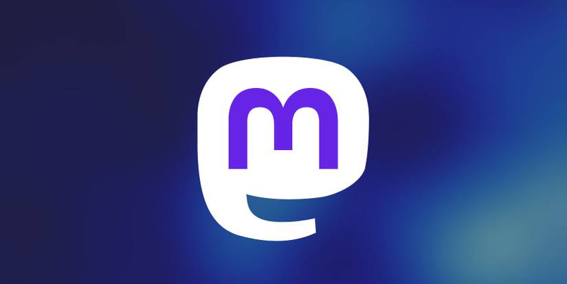 Mastodon logo seen on blurry blue background 