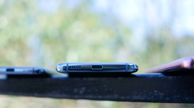USB-C port on a blue smartphone