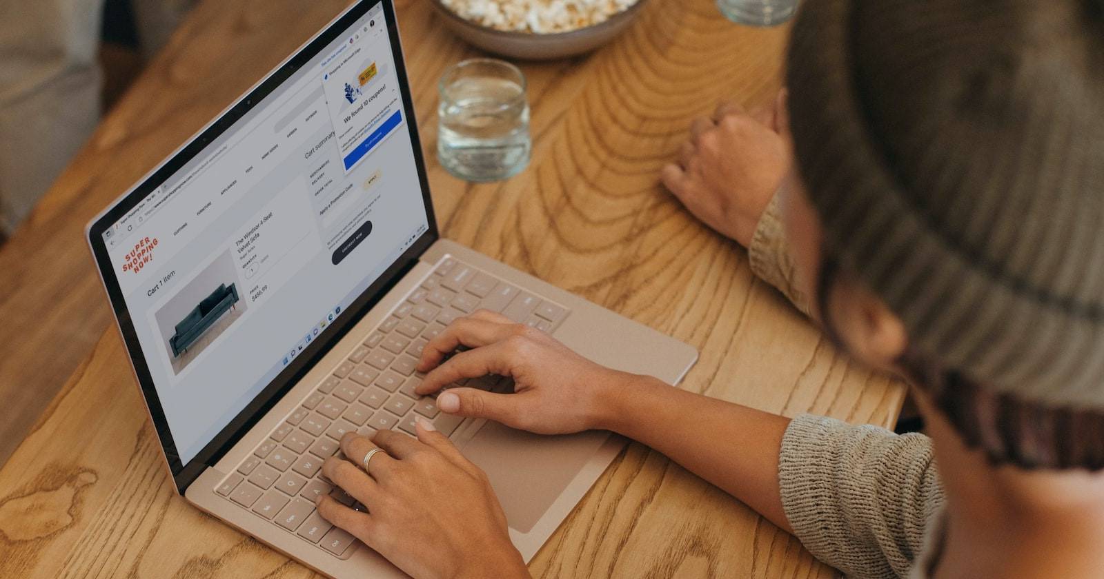 Person Typing on a Windows 11 Laptop