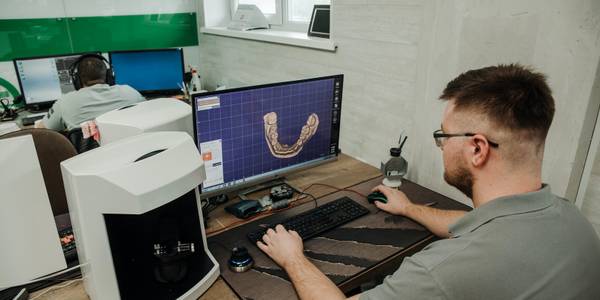 Man looking at an image on a computer