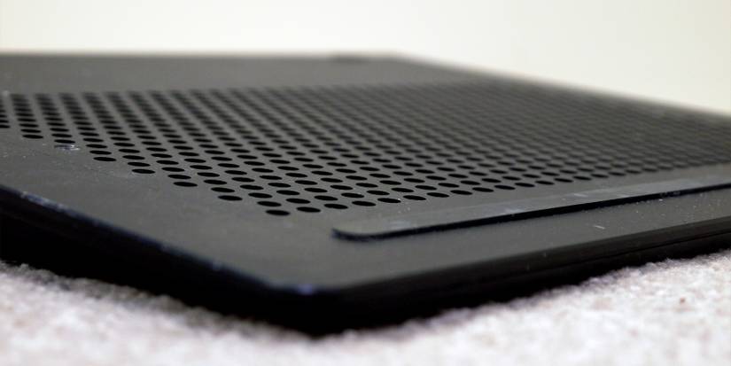 a black aluminum laptop cooling pad