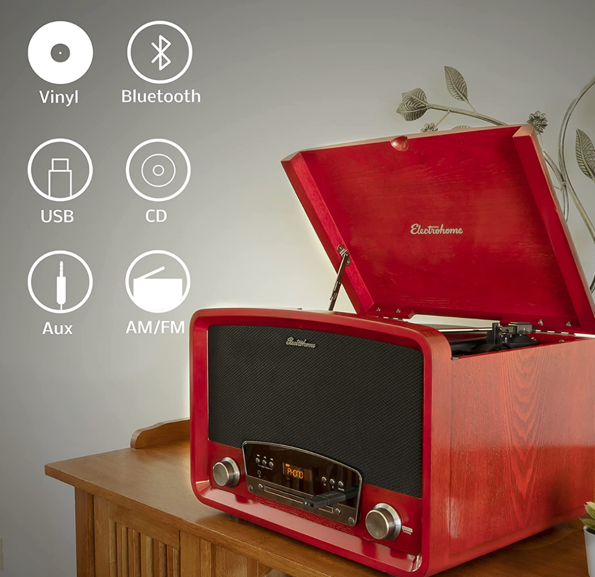 A red Electrohome Kingston 7-in-1 Record Player with features illustrated