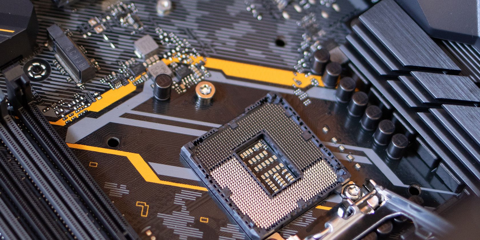 picture of a motherboard showing the processor, nvme, and ram slots