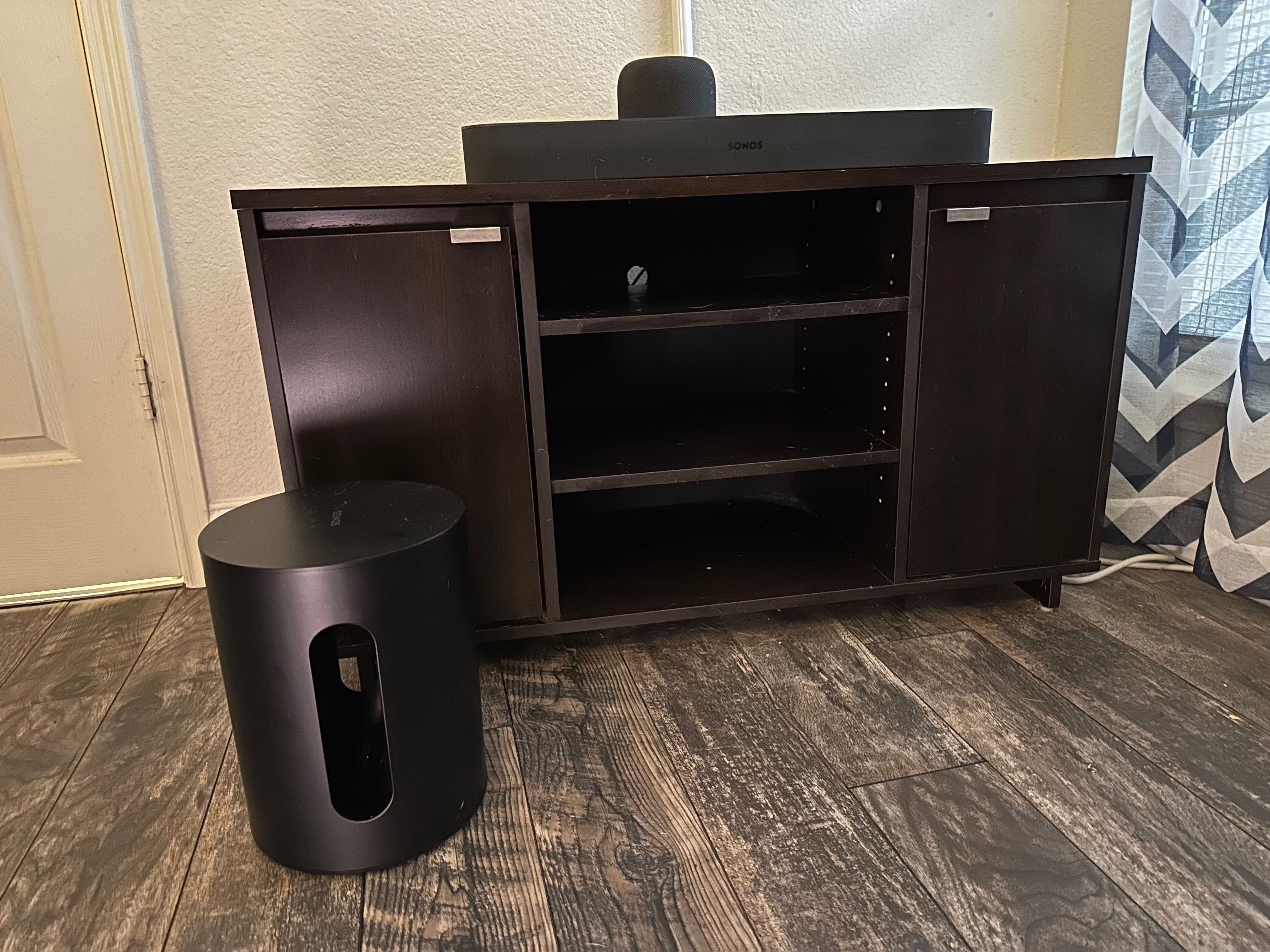 Sonos Sub Mini next to TV unit