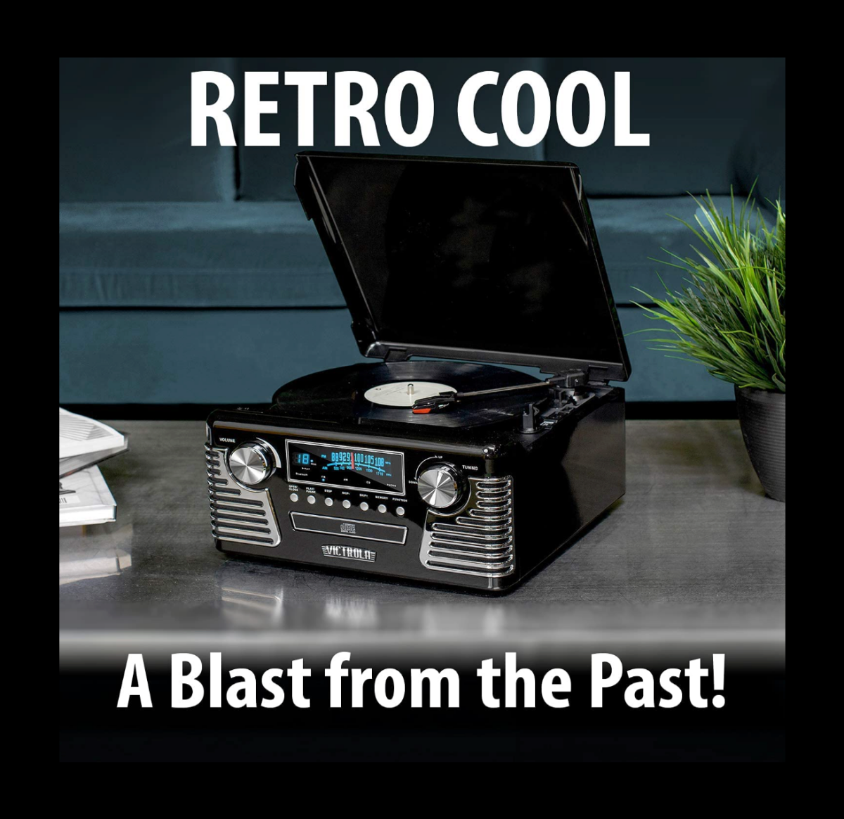A black Victrola 50s Retro Bluetooth Record Player & Multimedia Center sitting on a shelf