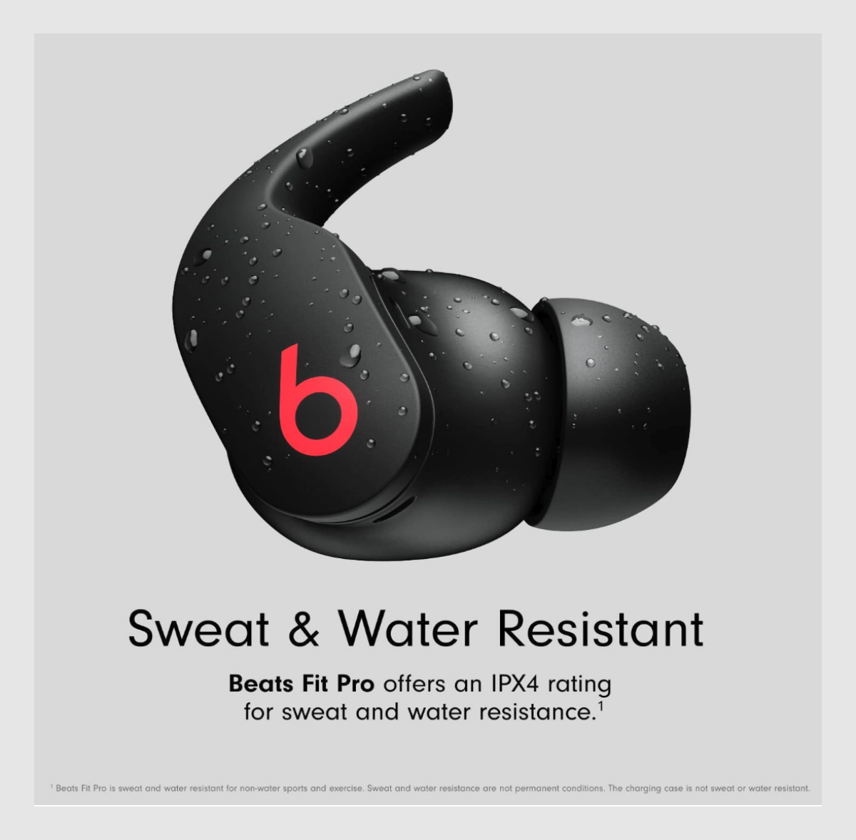 A single Beats Fit Pro demonstrating its water-resisting capability