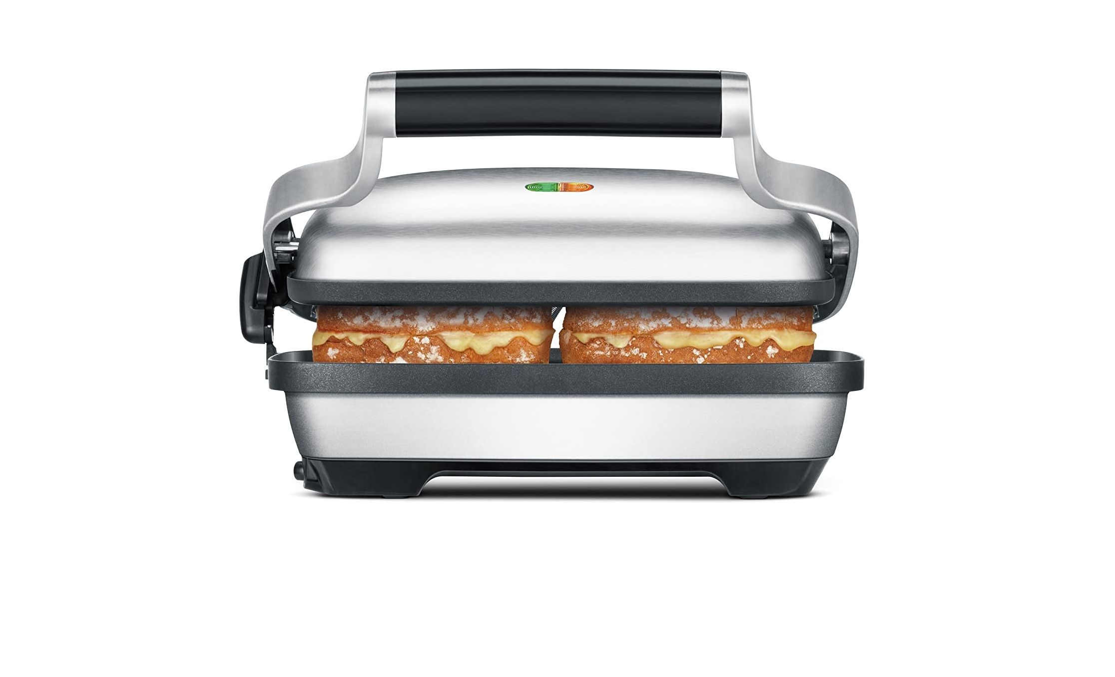 grilled cheese being cooked in the breville bsg600bss panini press