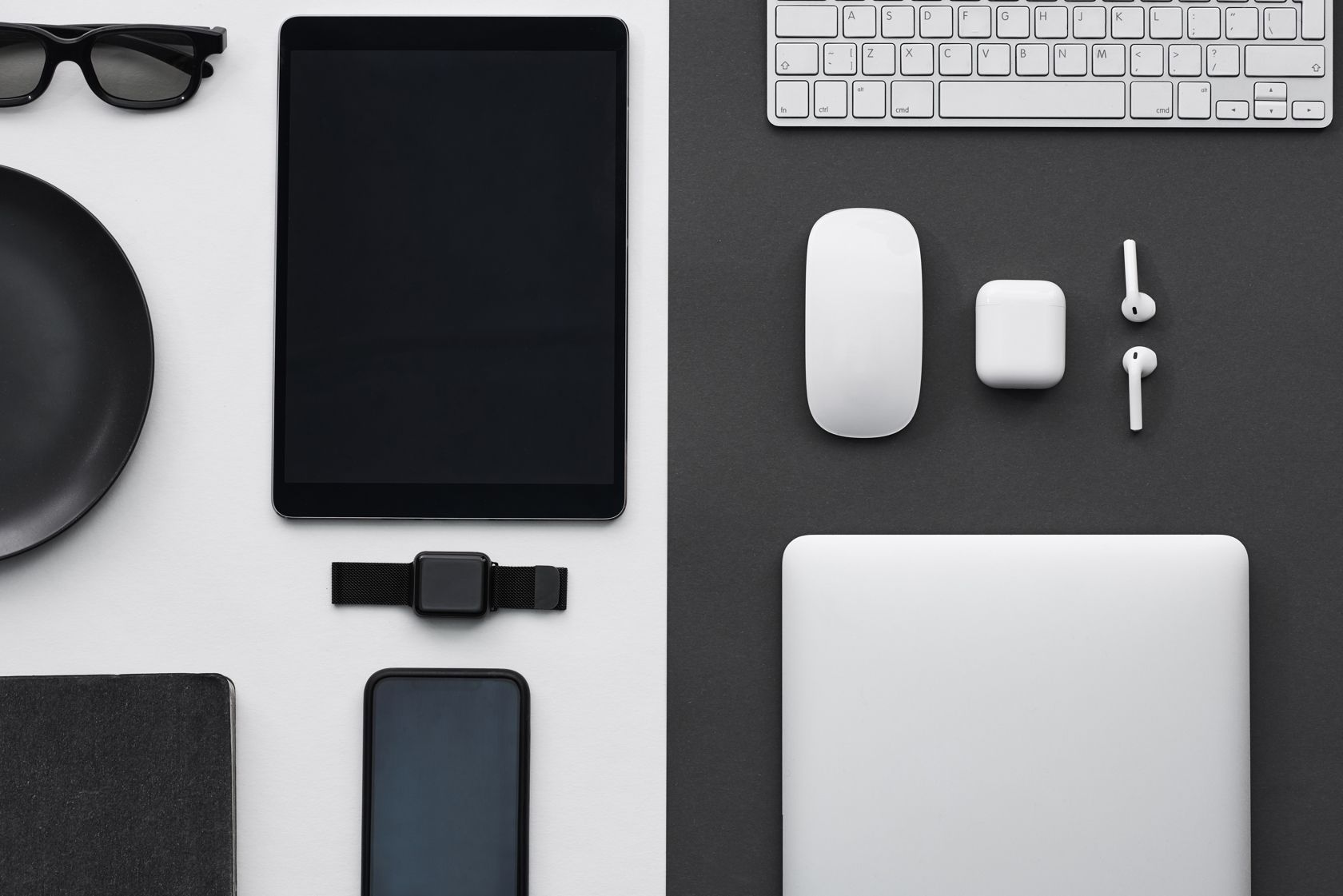a flat lay of different gadgets and devices