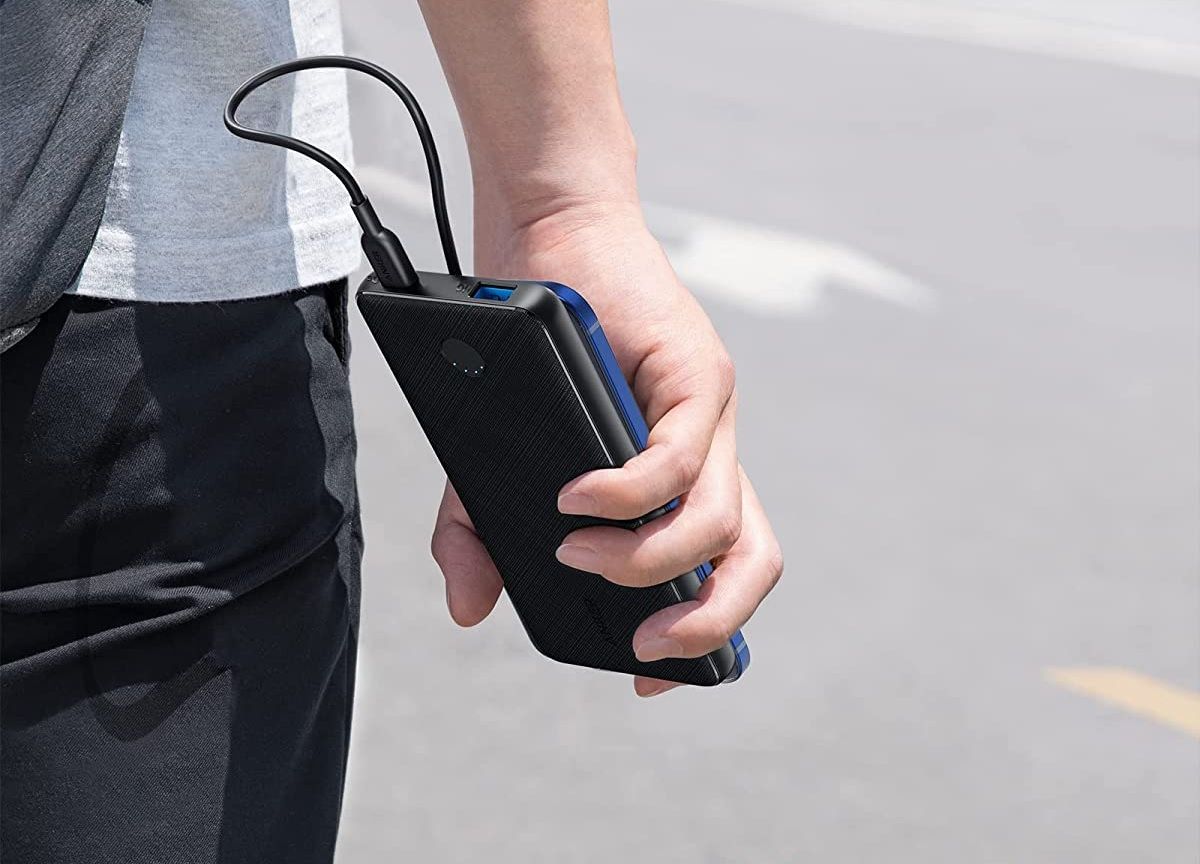 the anker 523 power bank connected to a mobile device via usb-c
