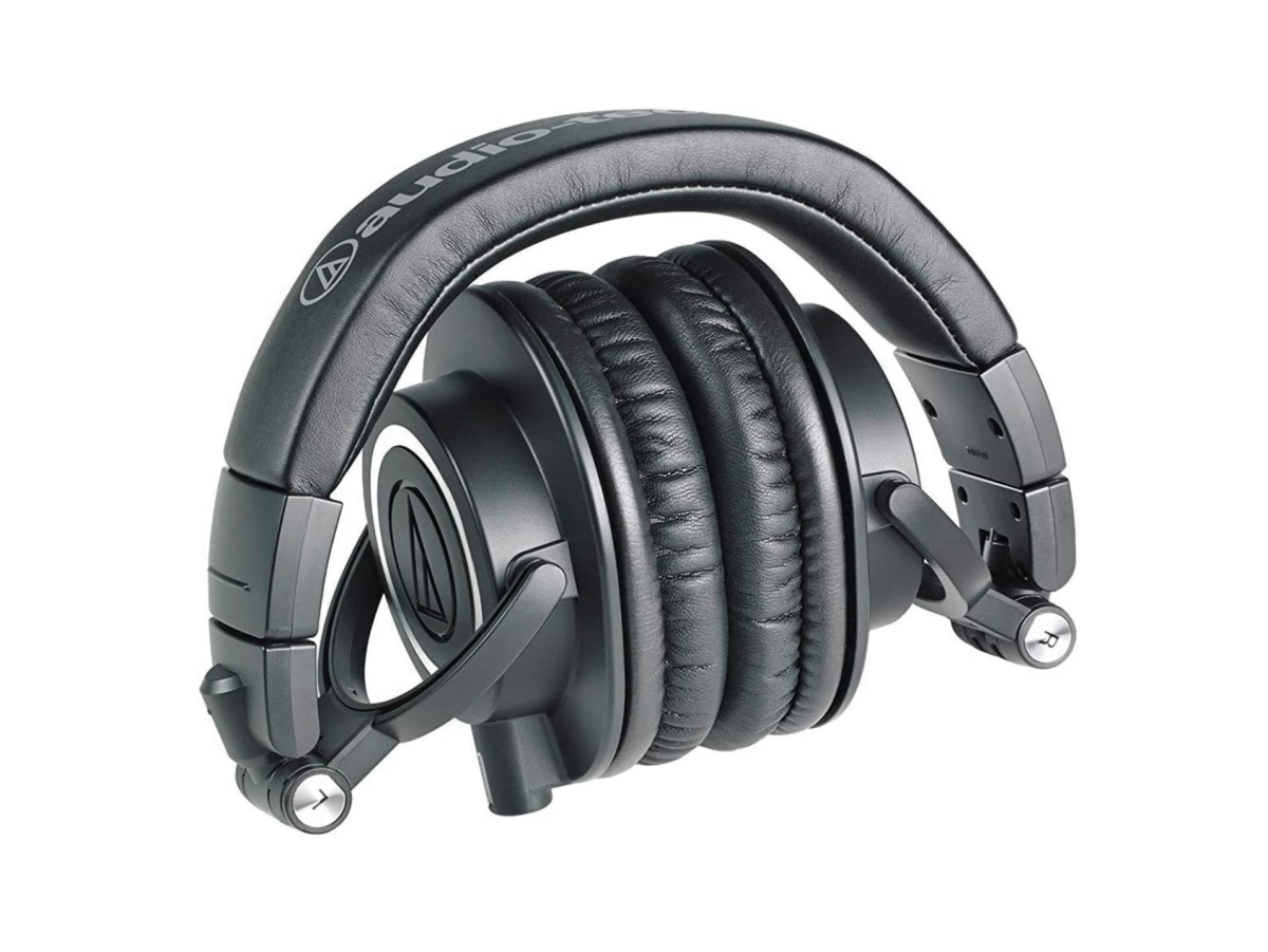 A pair of folded Audio-Technica ATH-M50x headphones