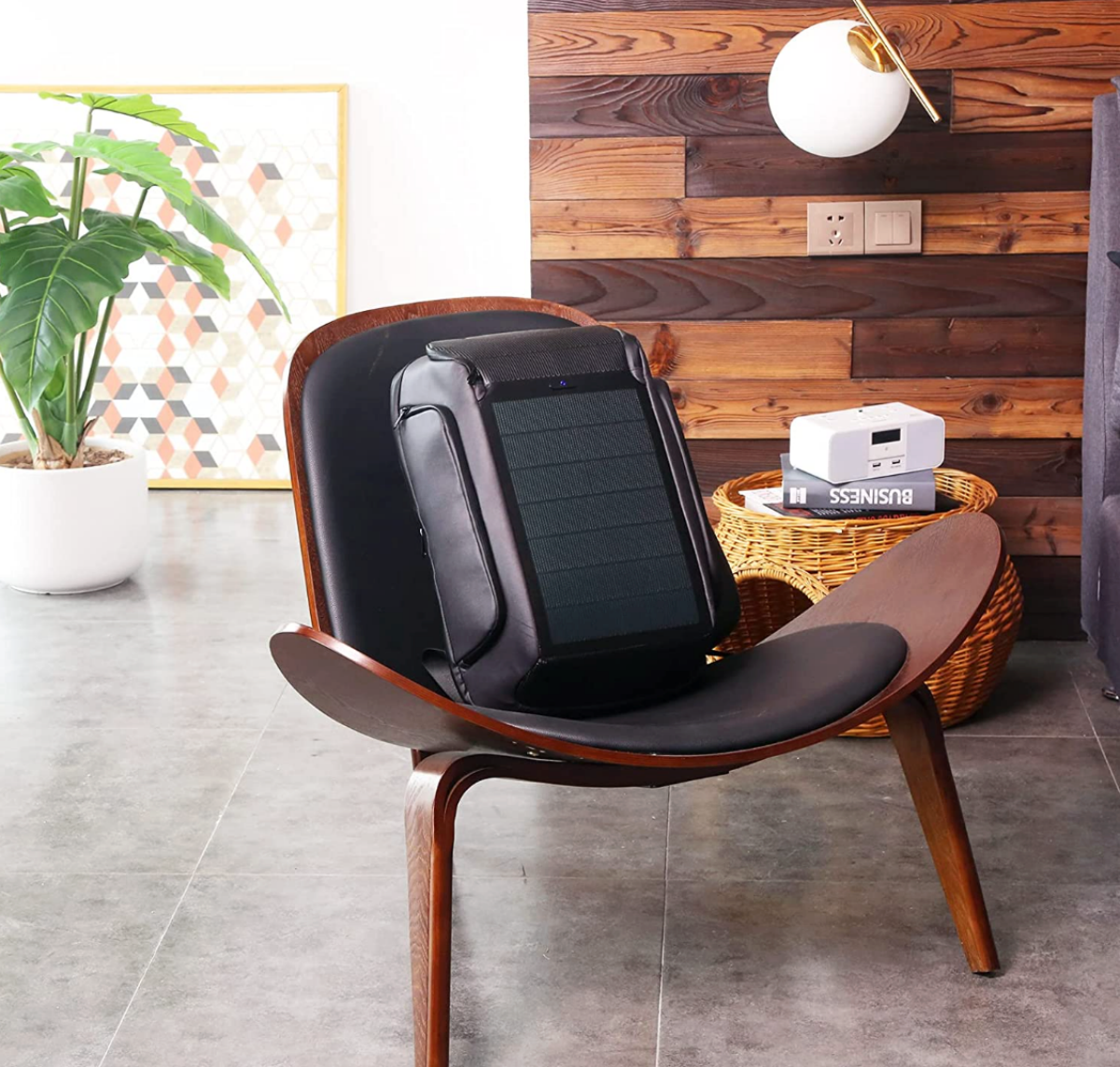A Kingsons Beam Solar Backpack on a chair
