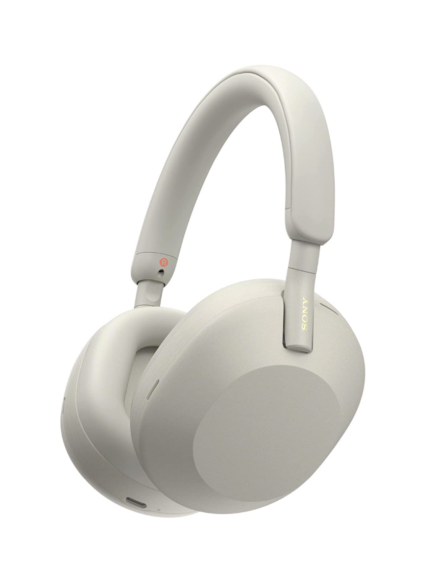 A pair of white Sony WH-1000XM5 headphones
