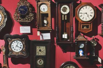 wall clocks with Windows logo and penguin art