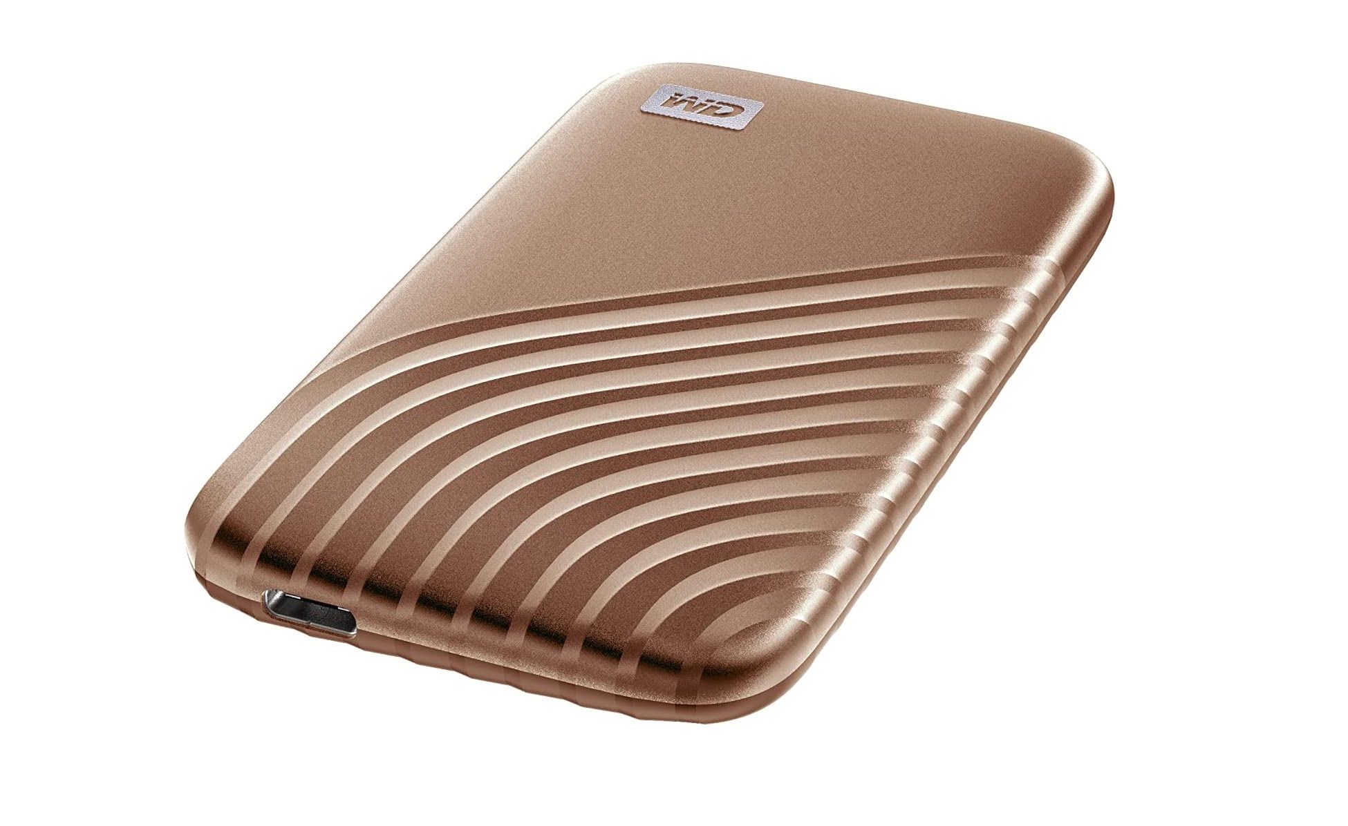 western digital my passport solid state drive with a gold finish
