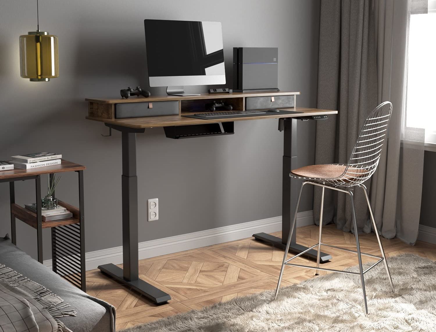 the banti electric standing desk positioned in a bedroom