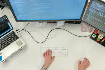 engineer working on cloud init scripts on a linux pc